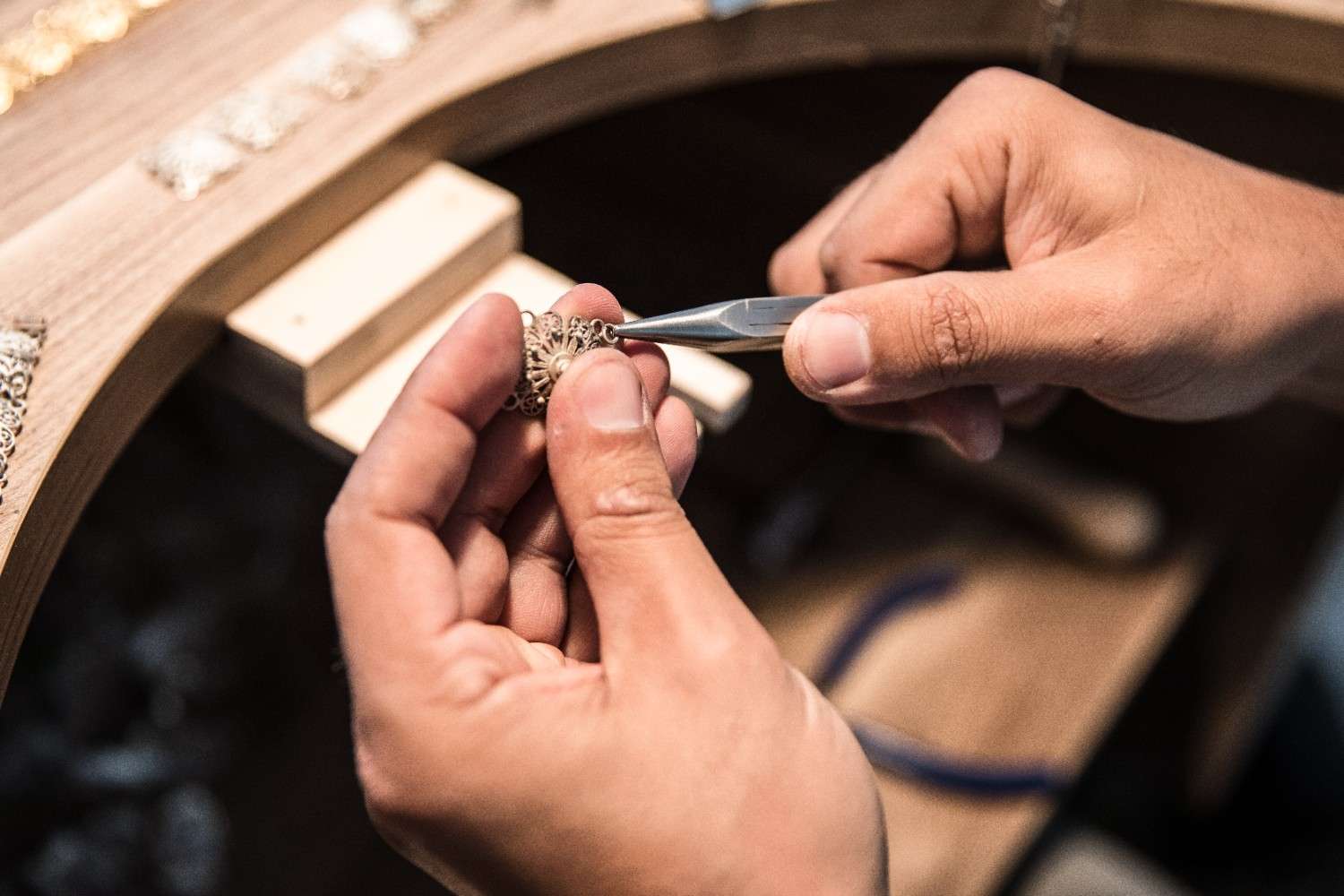 jewelry-maker-creating-golden-piece (1)